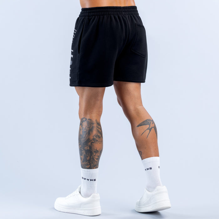 Black jogger shorts, back view with DFYNE text on leg hems