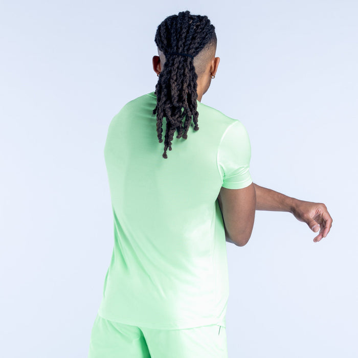 Light green active top, back view, short sleeves and crew neckline