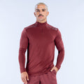Maroon quarter-zip long-sleeve athletic top with mock collar and small chest logo