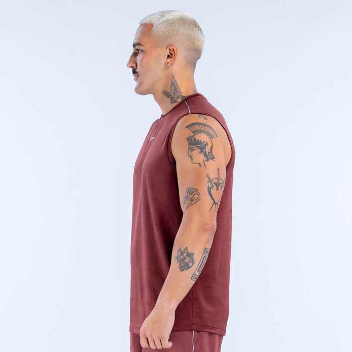 Burgundy sleeveless tank top with crew neckline, side view