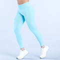 Light blue ankle-length high-waist leggings with small waistband logo
