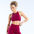Maroon high-neck backless sports bra with racer-back style