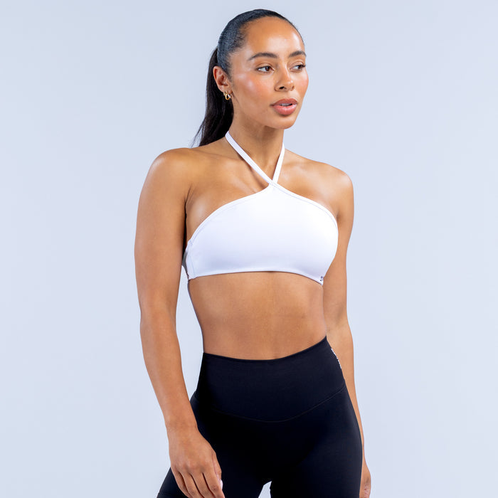 White high-neck halter bra with cross straps and smooth molded cups