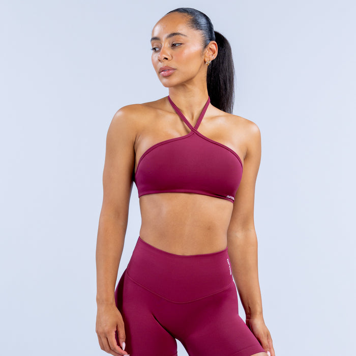 Dynamic high-neck halter bra in dark berry with cross halter straps