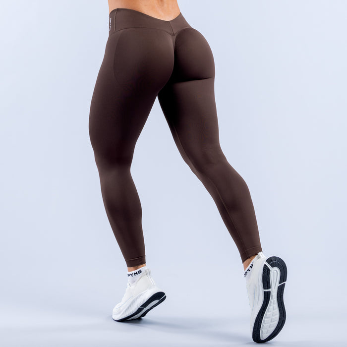 Dark brown ankle-length leggings with smooth stretch fabric and fitted legs