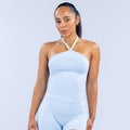 Light blue halter longline top with crisscross halter neckline