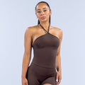 Dark brown longline halter top with halter strap and contoured waist seam