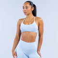 Light blue seamless sports bra with scoop front and thin shoulder straps