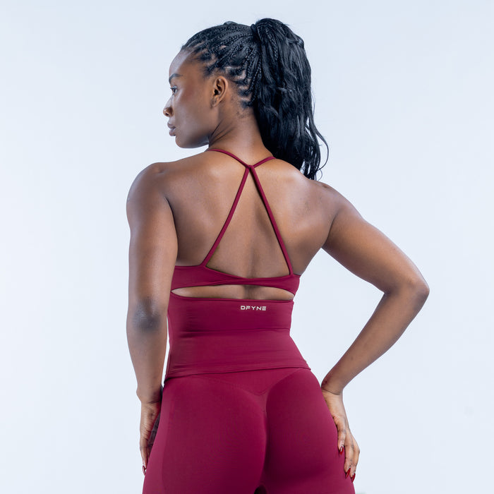 Burgundy twist-back active top with crisscross back straps