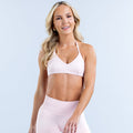 Hannah Pearson light pink halter neck bra with thin straps, front view