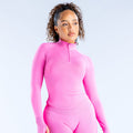 Women’s pink fitted long-sleeve half-zip top with high collar and quarter zip