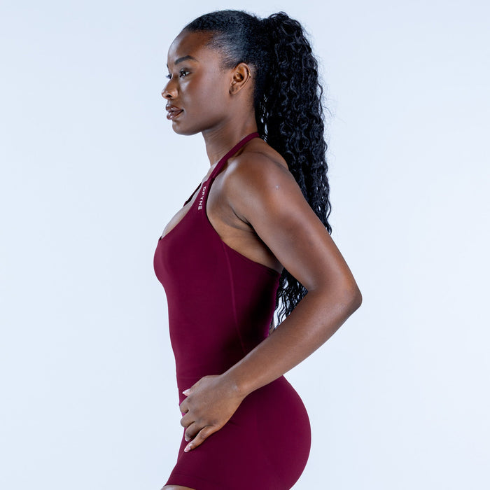 Maroon halter top in side profile with strappy halter neckline
