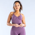 Purple longline strappy sports top with ruched V-neck front