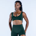 Impact scoop back sports bra in dark green with wide straps and stretch fit