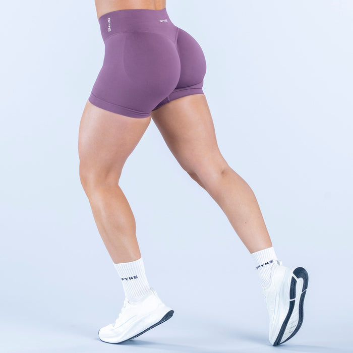 Purple 4.5-inch fitted athletic shorts, elastic waistband, rear view
