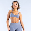 Women’s strappy sports bra, light blue triangle cups with ruched center and thin straps
