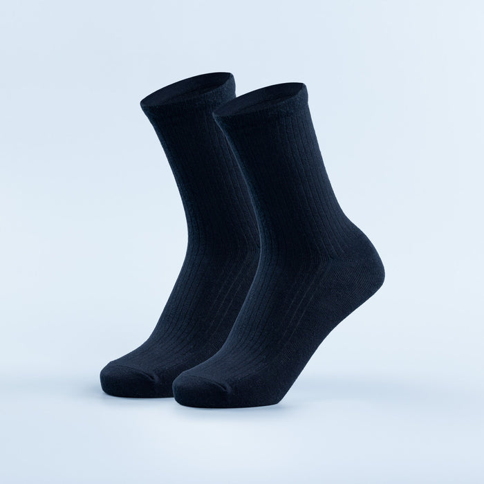 Pair of dark navy crew socks with ribbed knit texture