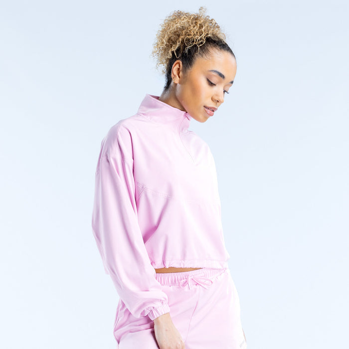 Pink cropped zip jacket in side view, high neck with zip-up front
