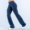Dark blue flare leggings with fitted waist and wide flared legs