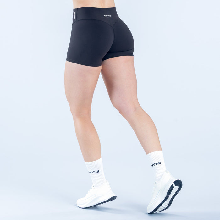 Origin shorts, dark black mid-rise athletic boxer-style with waistband logo