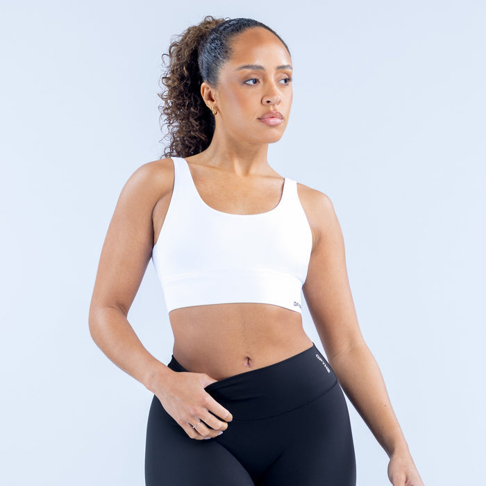Origin sports bra white front with wide straps and smooth stretch fabric