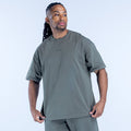 Men's olive green graphic t-shirt with small chest logo, crew neck