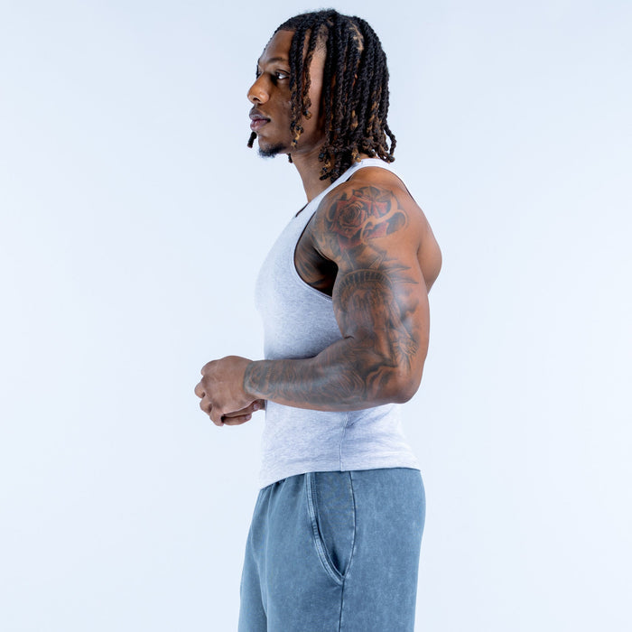 Light blue ribbed sleeveless tank top with crew neck, profile view