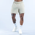 Light sage washed shorts with elastic waistband and cuffed hem, side view