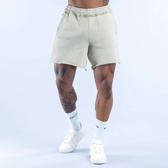 Light sage washed shorts with elastic waistband and cuffed hem, side view
