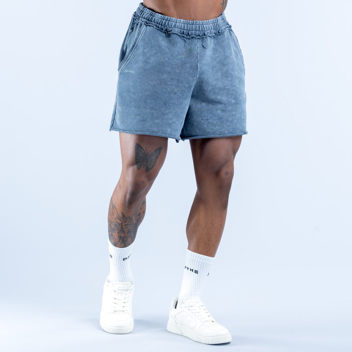 Washed blue denim shorts with gathered elastic waistband and side hand pockets