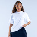 White boxy crew-neck T-shirt with short sleeves and small chest logo