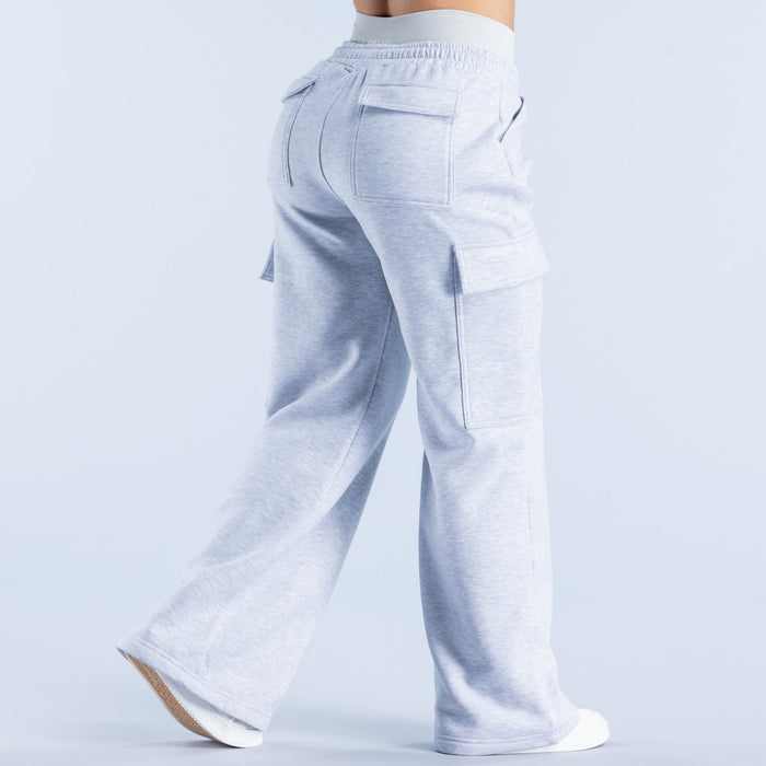Light blue cargo jogger pants, back view with large flap pockets at hips