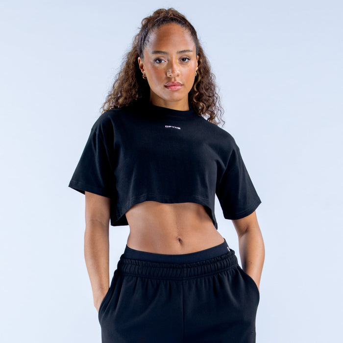Black cropped graphic tee with short sleeves and crew neck