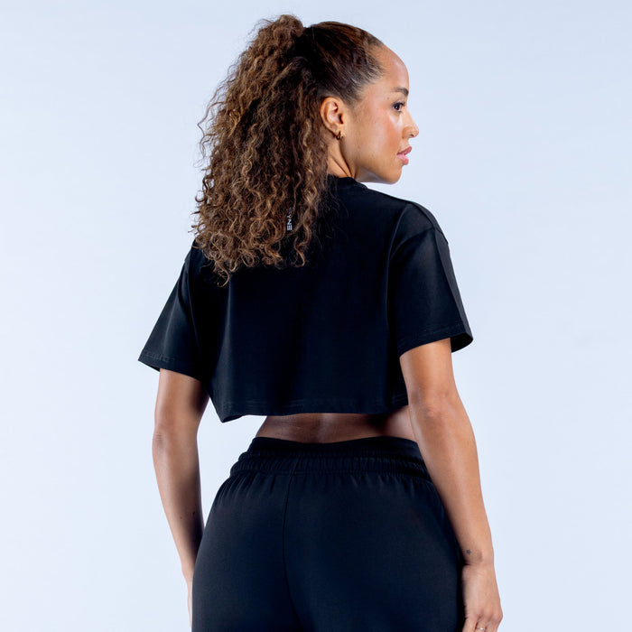 Black cropped tee, back view, short sleeves and crew neck