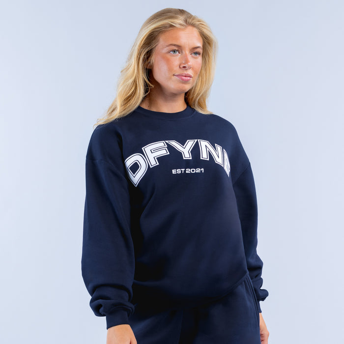 Navy DFYNE logo sweatshirt with EST 2021 text on chest, long sleeves