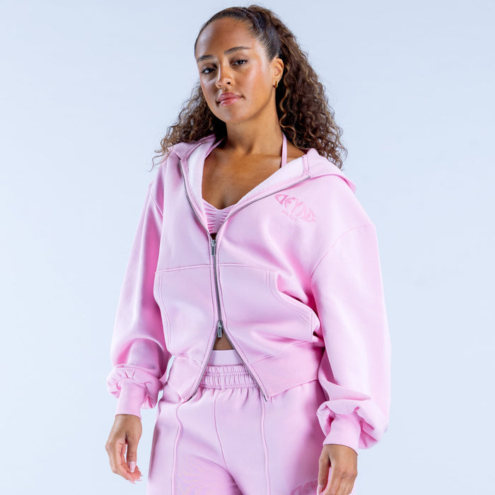 Lilac zip hoodie with hood, drawstring hem, and small chest graphic