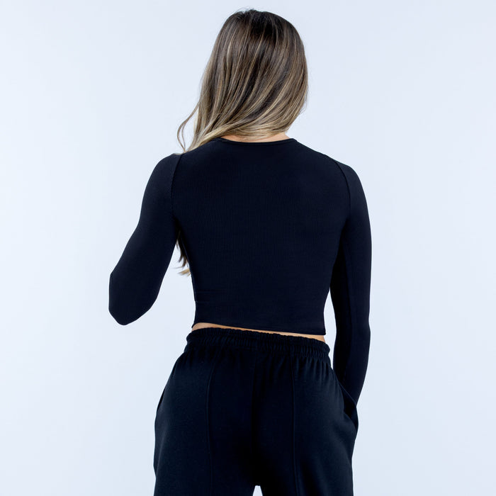 Dark ribbed long sleeve crop top, scooped back with fitted waist hem