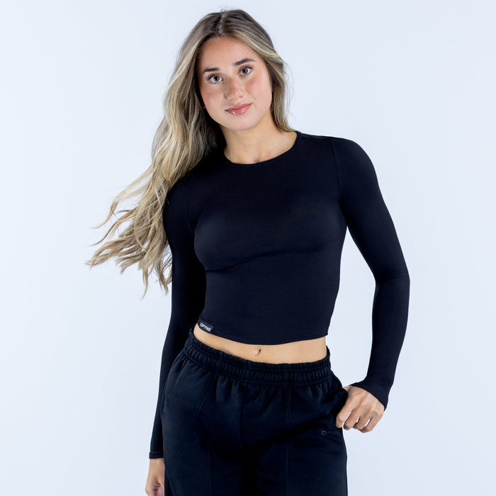 Dark ribbed long sleeve crop top, crew neckline and smooth fitted silhouette