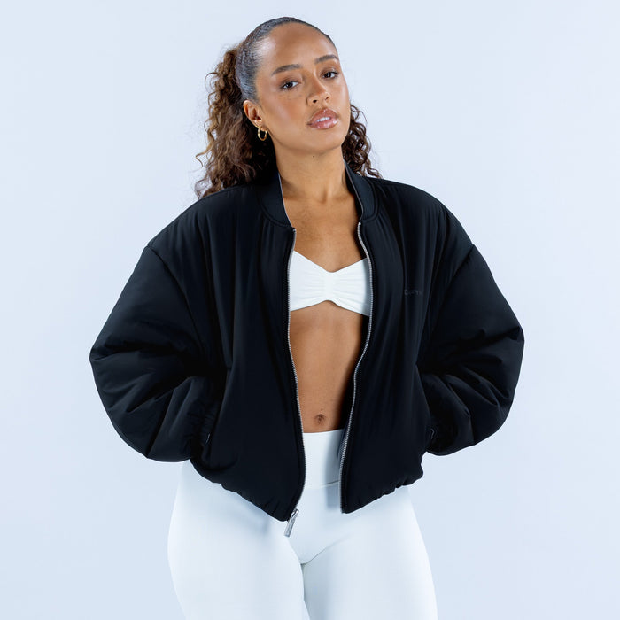 Black reversible bomber jacket with zip closure and slouchy sleeves
