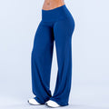 Blue fold-over wide-leg pants with draped front, full-length wide leg