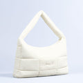 Sav puffer bag in ivory with top handle and quilted panels