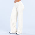 Women's off-white wide-leg pants with high-rise waist and flowing wide leg opening
