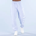 Light blue cuffed jogger pants with elastic waistband and side logo print