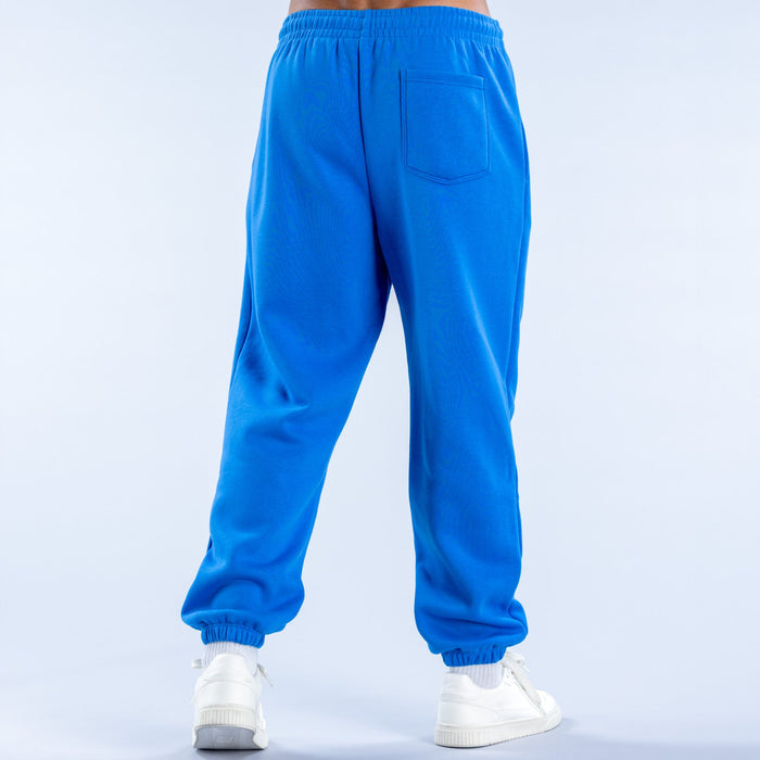 Blue cuffed jogger pants with elastic waistband and patch back pockets