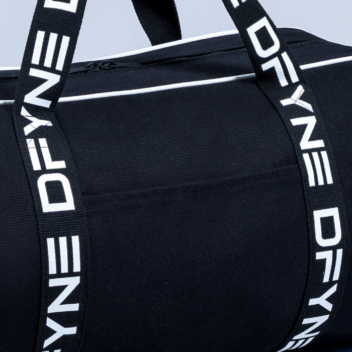 Black duffle bag with wide white logo webbing handles and top strap