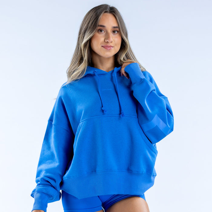 Blue pullover hoodie with front kangaroo pocket, hood drawstring and ribbed cuffs