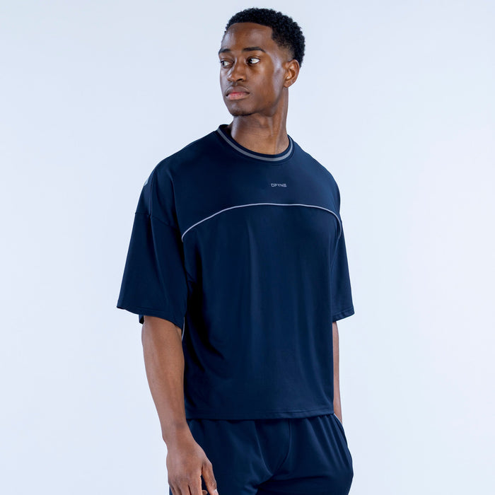 Navy crew-neck jersey with short sleeves and thin white curved chest panel