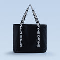 Black tote bag with top handles and vertical logo print straps