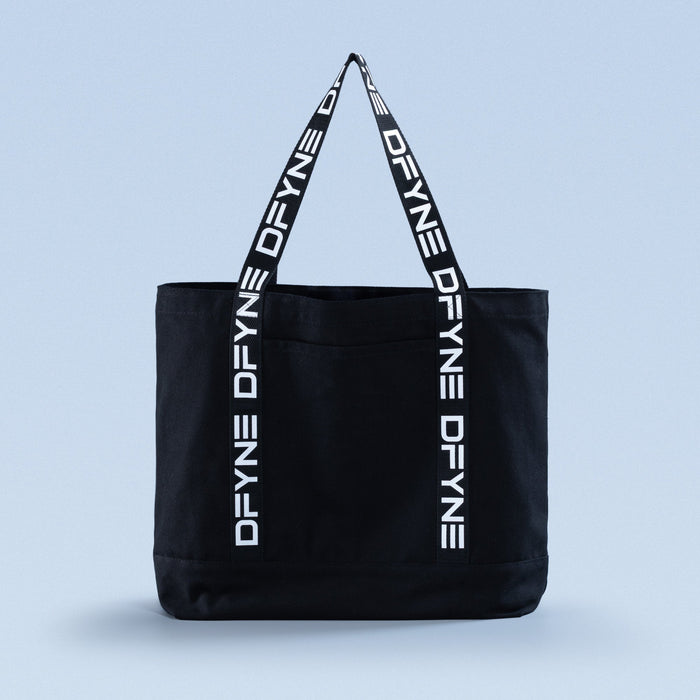 Black tote bag with top handles and vertical logo print straps