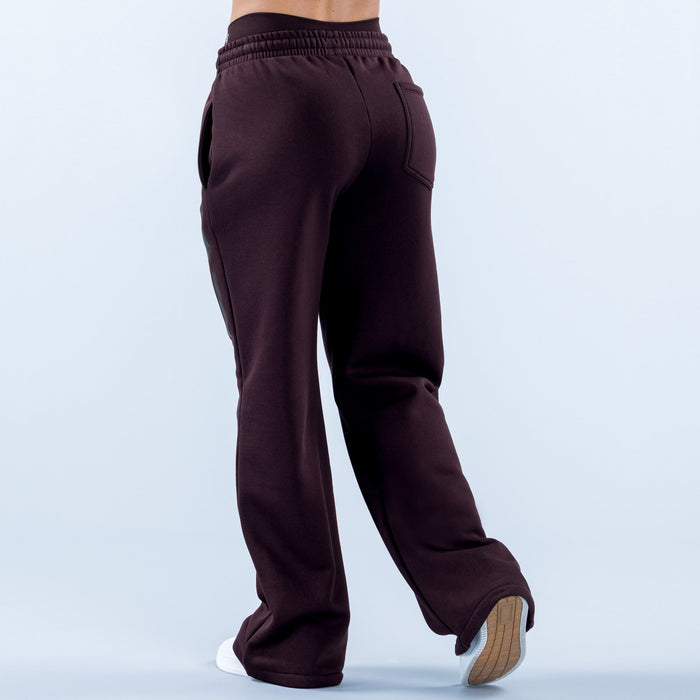 Dark maroon wide-leg jogger pants with elastic waistband and side pocket, cuffed ankle hem